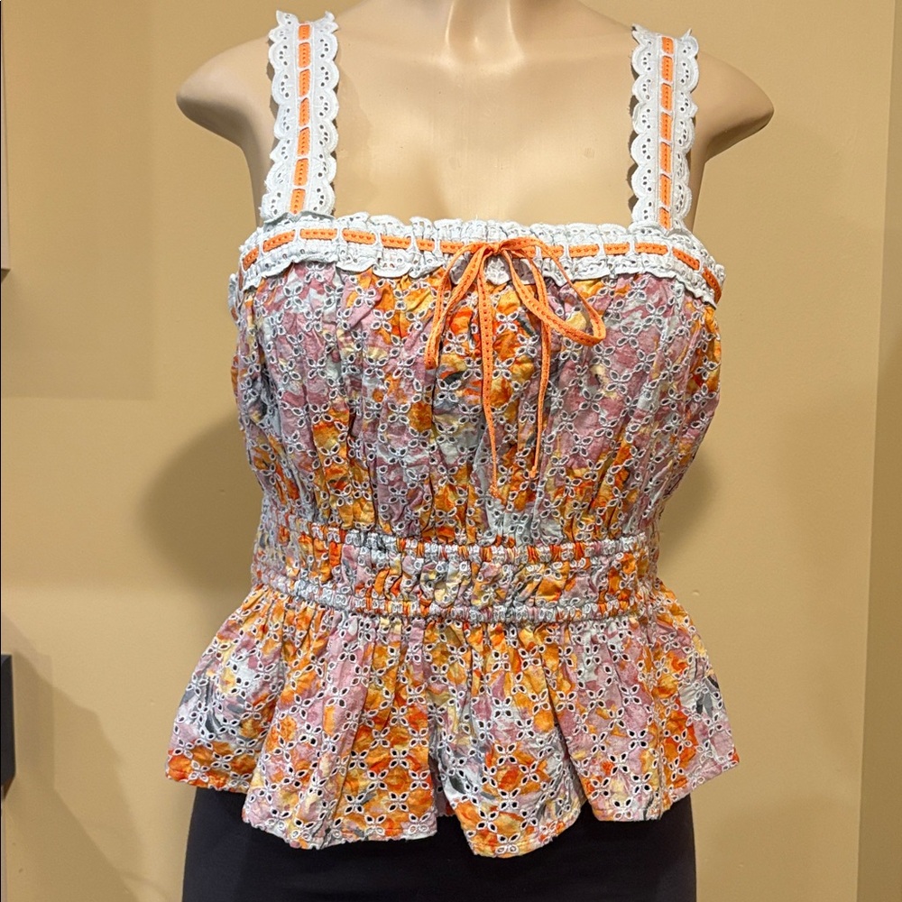 Sam Edelman Doria Eyelet Peplum Top with lacy accents and embroidery